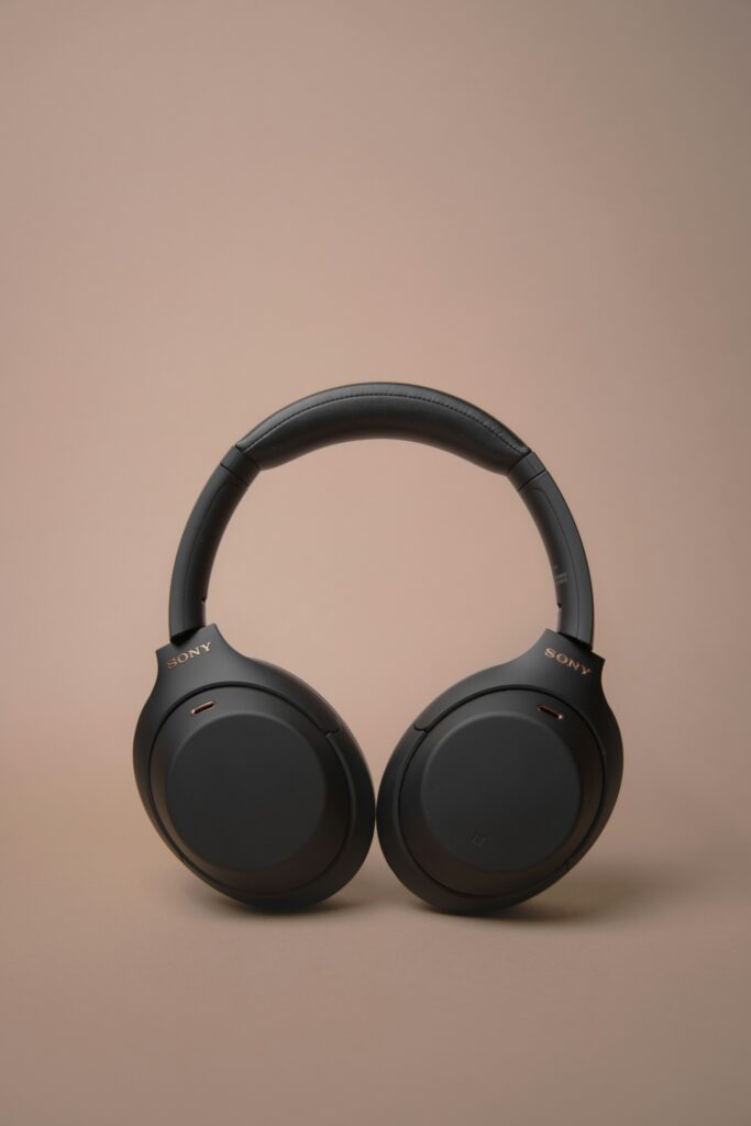 Minimalist shot of Sony noise-canceling headphones with over-ear design – clean studio background. 