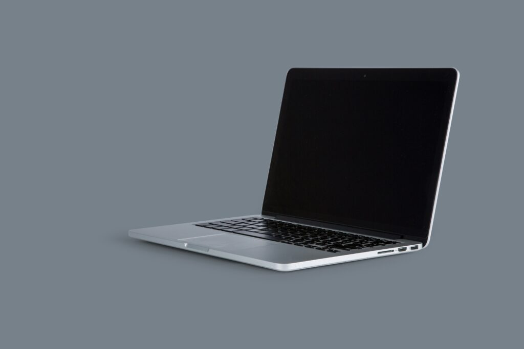 Sleek laptop in isolated minimal studio setup