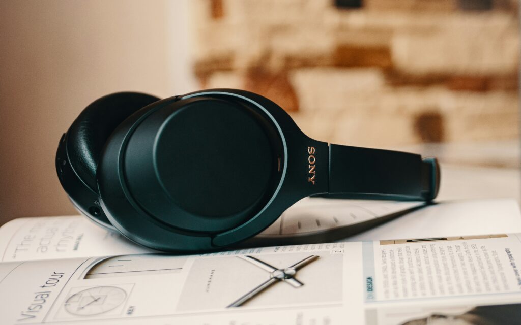 Close-up of Sony WH-1000XM6 headphones featured in a lifestyle magazine setting.