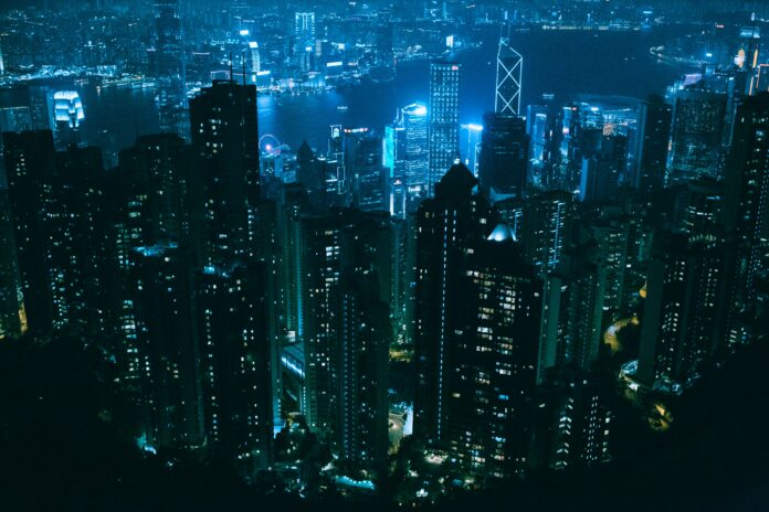 Top 5 Tech Trends to Watch in Late 2025 - Futuristic smart city skyline at night