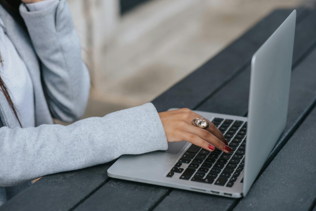 Content creator working on a laptop — flexible workspace setup