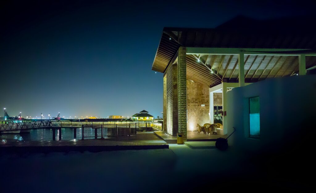 Smart home exterior lit up with automated night lighting

