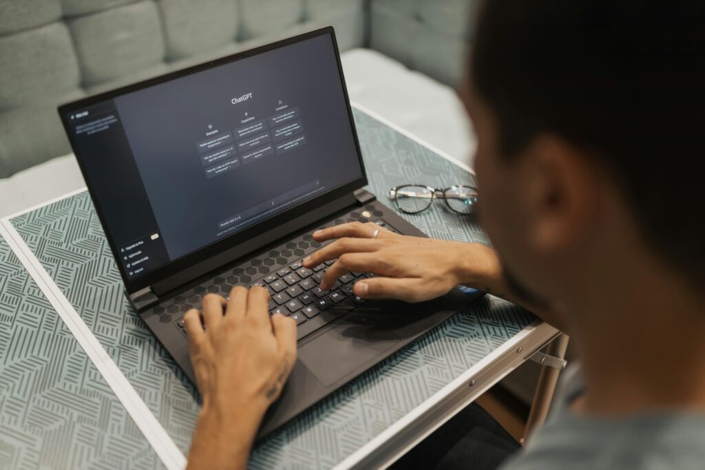 Real-world use of ChatGPT and AI tools to boost productivity on a laptop interface.