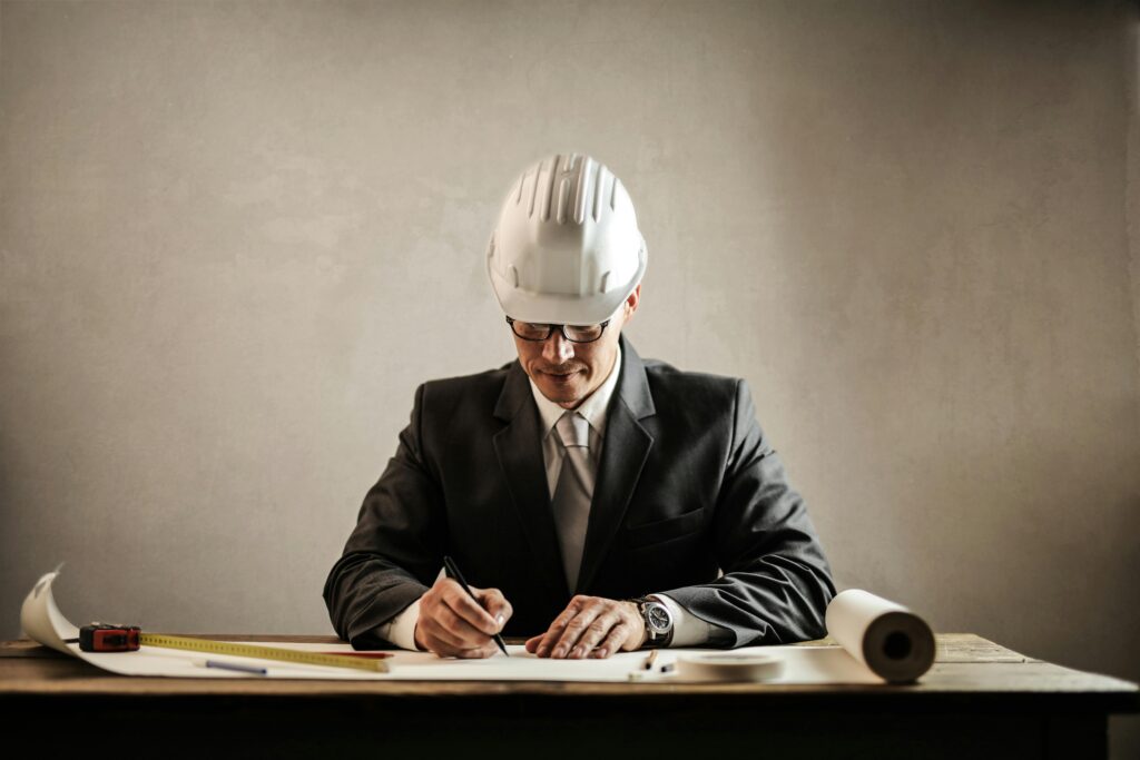 Engineer analyzing plans for AI infrastructure development