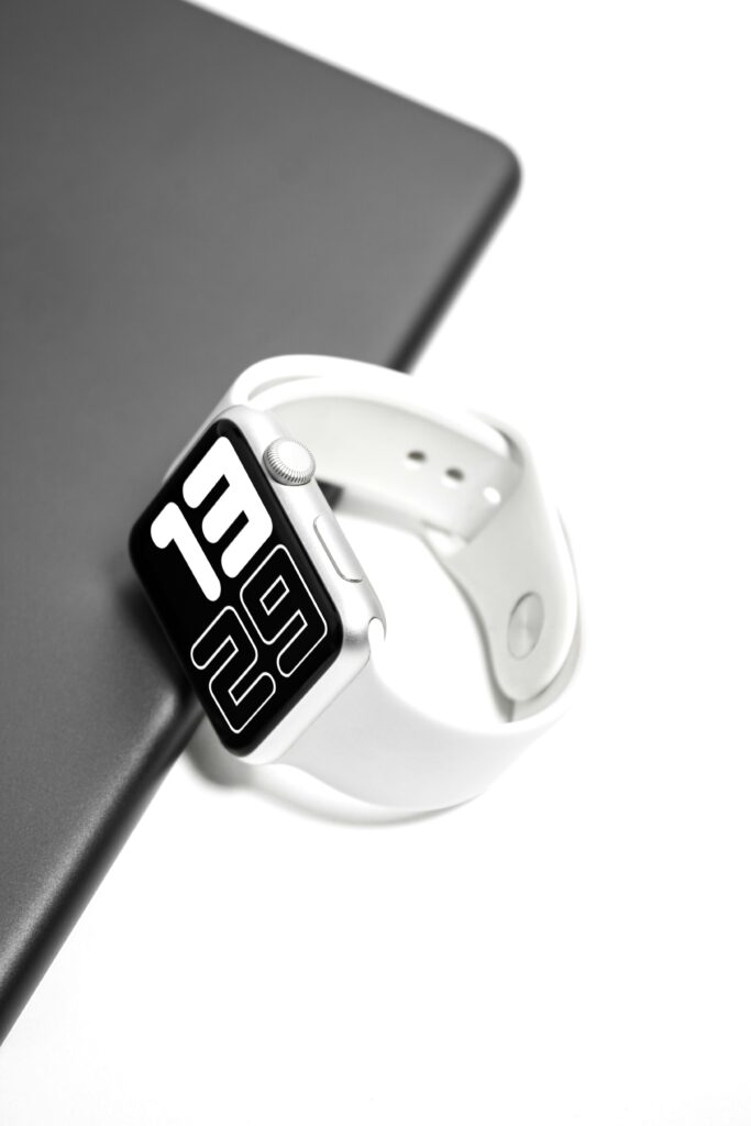 Close-up of a smartwatch with a bold digital clock — clean design trend seen in 2025’s top wearable tech.